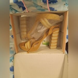 Yellow wedge shoes